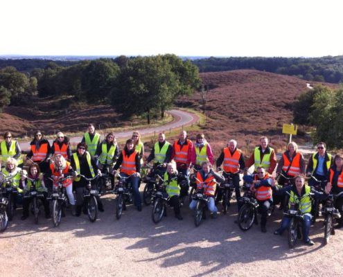 Solex Tour groepsfoto tijdens een uitje in Gelderland